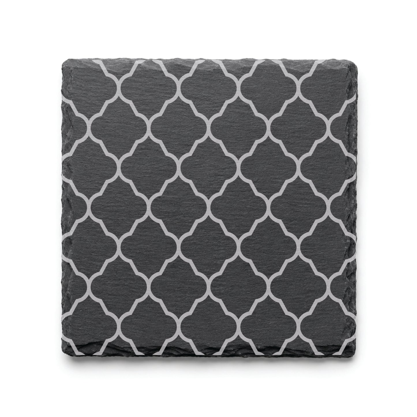 Quatrefoil engraved slate coaster featuring a classic geometric lattice pattern on natural black slate.