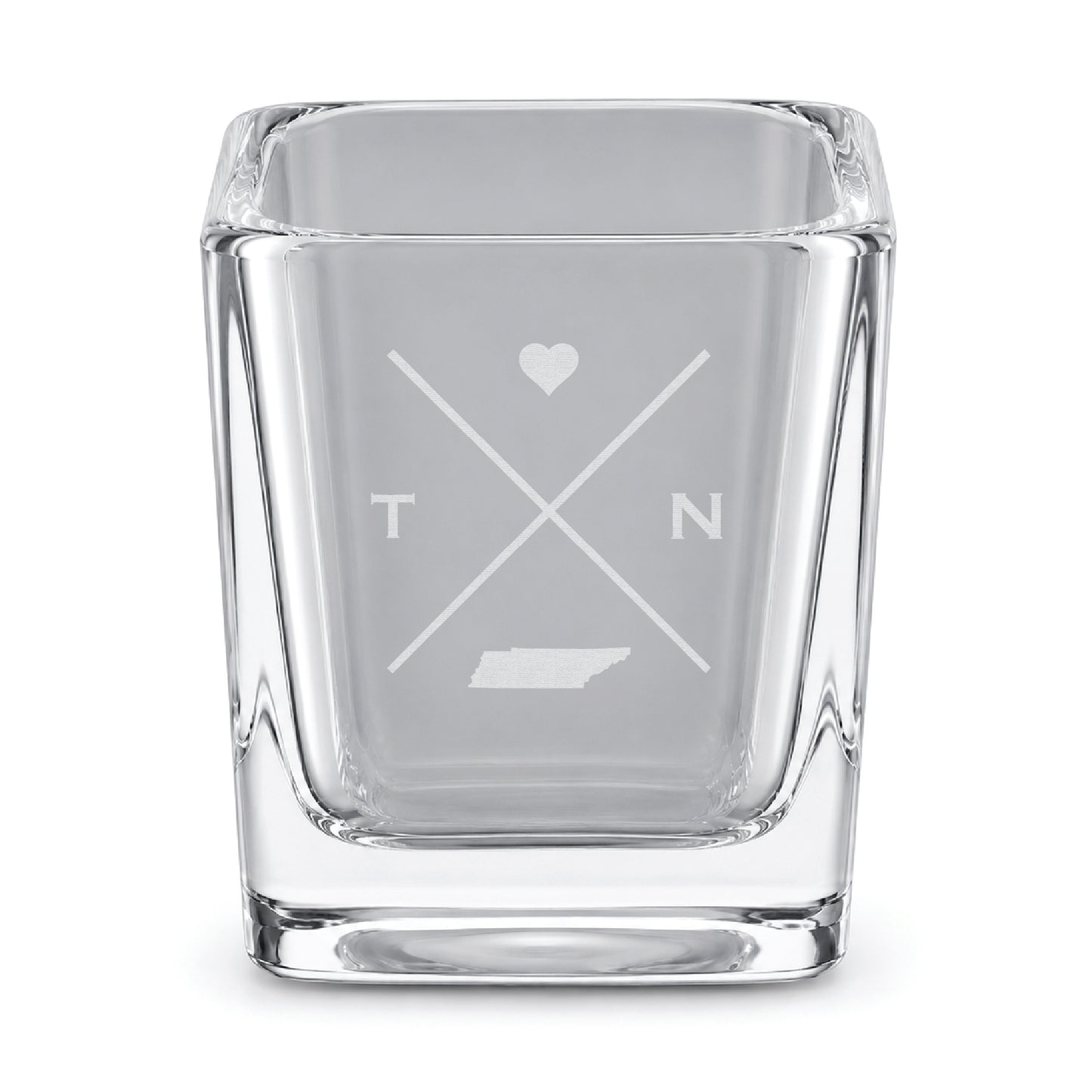 Clear engraved Tennessee shot glass featuring a minimalist crossed-line design with heart detail and Tennessee silhouette on a clean light background.