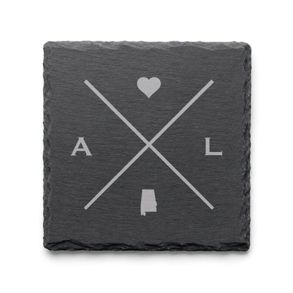 Engraved Alabama slate coaster featuring a minimalist crossed-line design with heart detail and Alabama silhouette on a clean light background.
