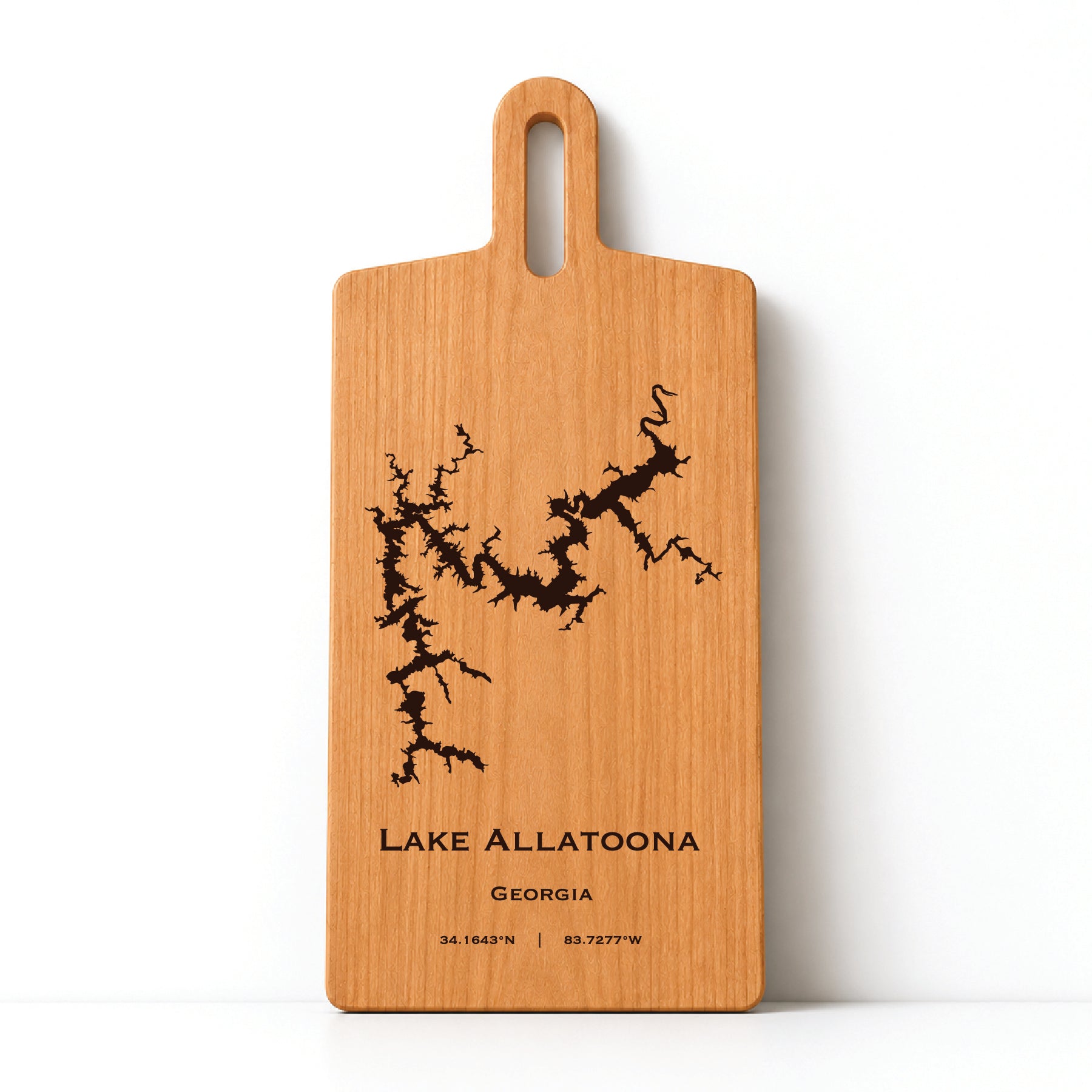 Minimal cherry wood serving board featuring engraved Lake Allatoona shoreline and coordinates