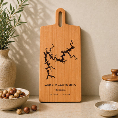 Lake Allatoona engraved serving board displayed on a neutral kitchen countertop with ceramic decor