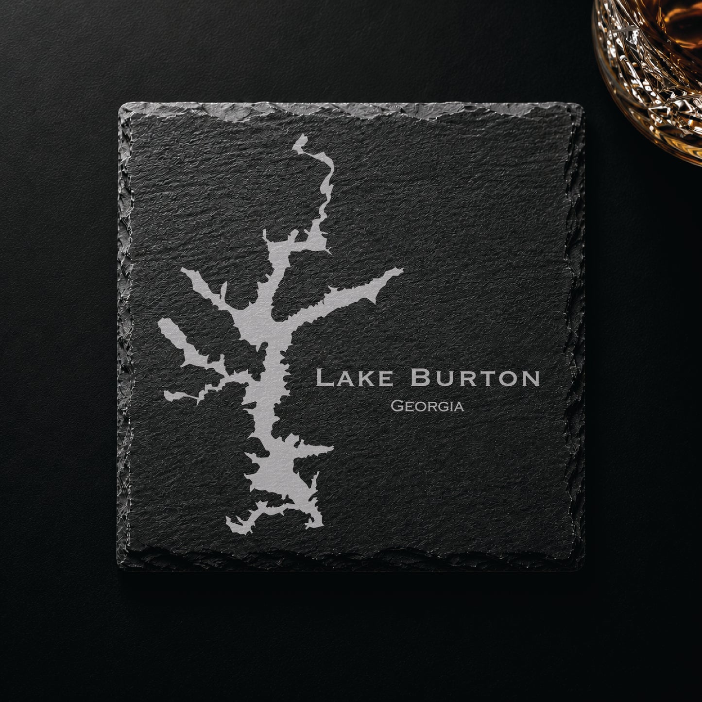 Dark slate coaster engraved with a detailed Lake Burton map and Georgia text on a dark background.