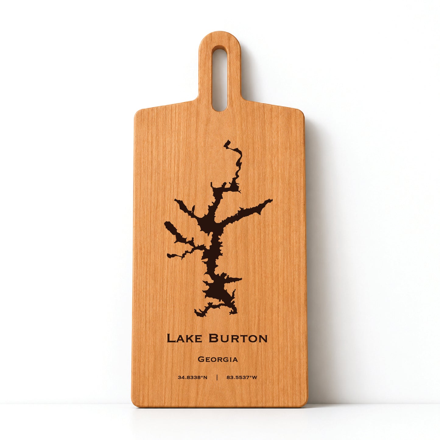 Minimal cherry wood serving board featuring engraved Lake Burton shoreline and coordinates