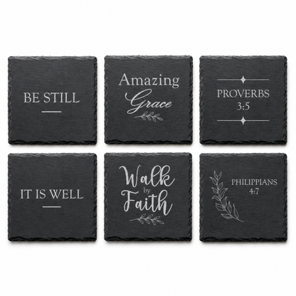 Six engraved Christian slate coasters arranged in a grid showing Be Still, Amazing Grace, Walk by Faith, It Is Well, Proverbs 3:5, and Philippians 4:7 designs on a white background.