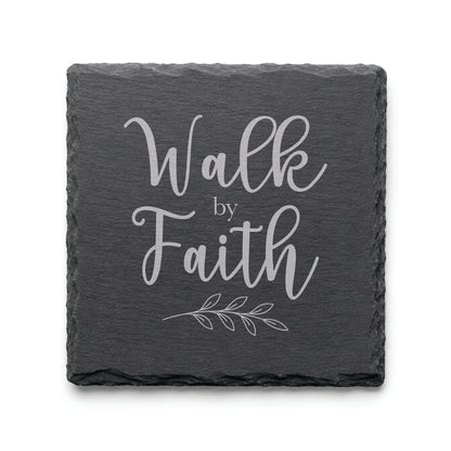 Black slate coaster engraved with the phrase Walk by Faith and a botanical accent branch.