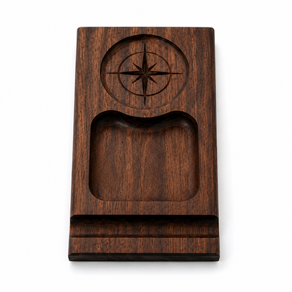 Wooden cigar tray with recesses for a rocks glass, snacks, and a cigar.  Rocks glass area is engraved with a compass design.  