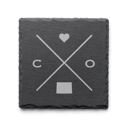Dark slate coaster with engraved Colorado crossed-line design, heart icon, and Colorado silhouette on a dark background.