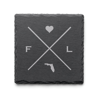 Engraved Florida slate coaster featuring a minimalist crossed-line design with heart detail and Florida silhouette on a clean light background.
