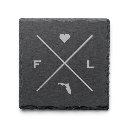 Engraved Florida slate coaster featuring a minimalist crossed-line design with heart detail and Florida silhouette on a clean light background.