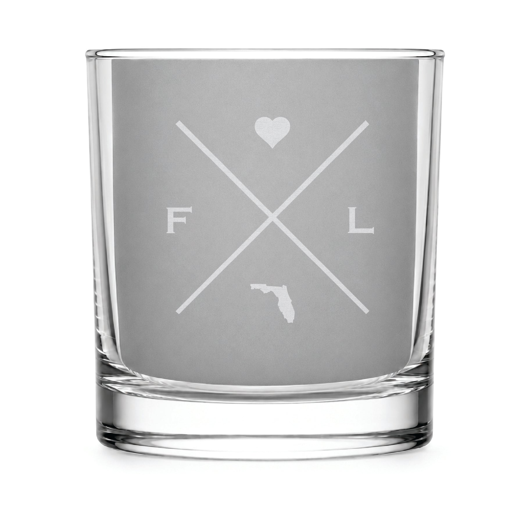 Clear engraved rocks glass featuring a minimalist crossed-line Florida design with monogram initials, heart icon, and Florida silhouette on a clean light background.