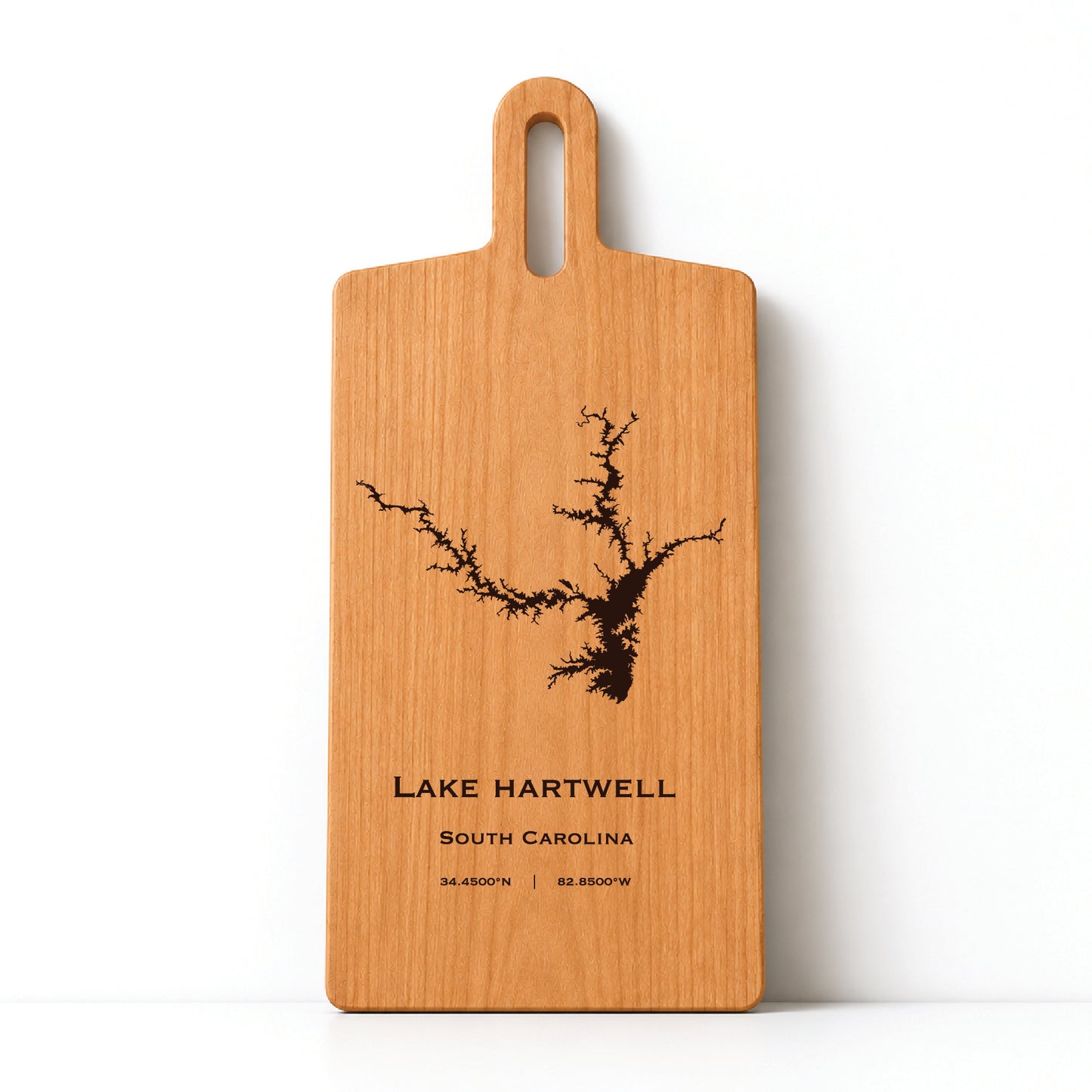 Minimal cherry wood serving board featuring engraved Lake Hartwell shoreline and coordinates