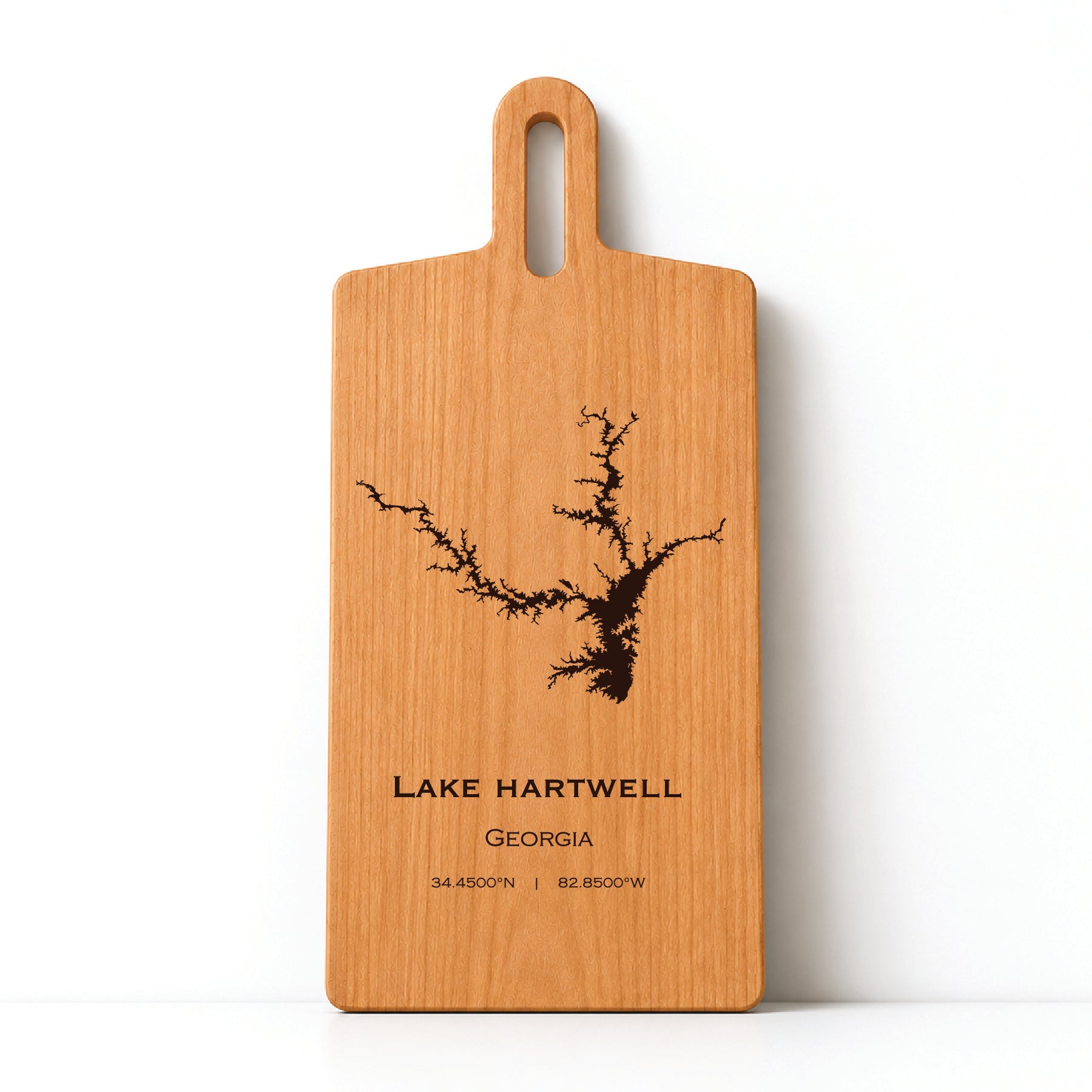 Minimal cherry wood serving board featuring engraved Lake Hartwell shoreline and coordinates