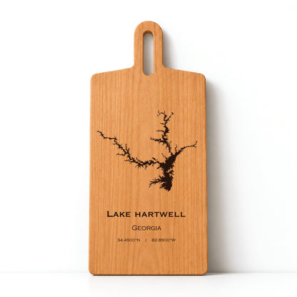 Minimal cherry wood serving board featuring engraved Lake Hartwell shoreline and coordinates