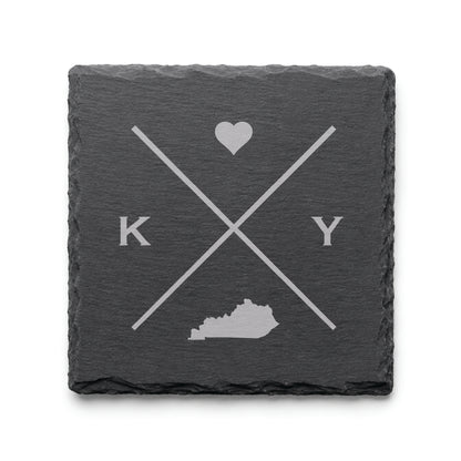 Engraved Kentucky slate coaster featuring a minimalist crossed-line design with heart detail and Kentucky silhouette on a clean light background.v