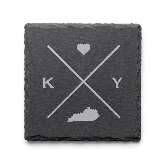 Engraved Kentucky slate coaster featuring a minimalist crossed-line design with heart detail and Kentucky silhouette on a clean light background.v