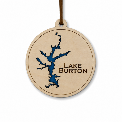Layered wood Lake Burton ornament with blue lake detail and brown hanging cord on a clean light background.