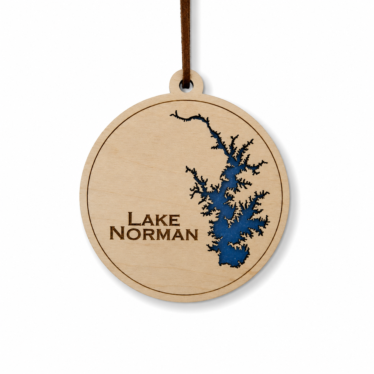 Layered wood Lake Norman ornament with blue lake detail and brown hanging cord on a clean light background.