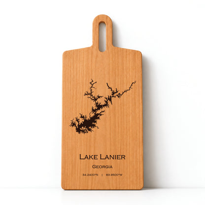 Minimal cherry wood serving board featuring engraved Lake Lanier shoreline and coordinates