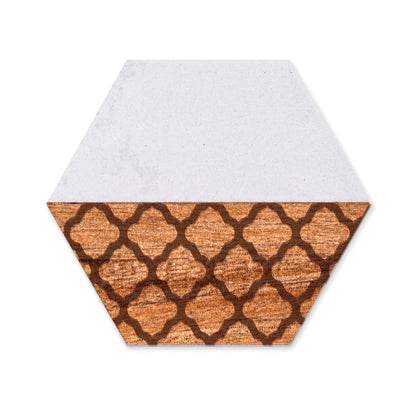 Hexagon faux marble and acacia wood coaster featuring an engraved quatrefoil pattern on the wood section, shown on a white background.
