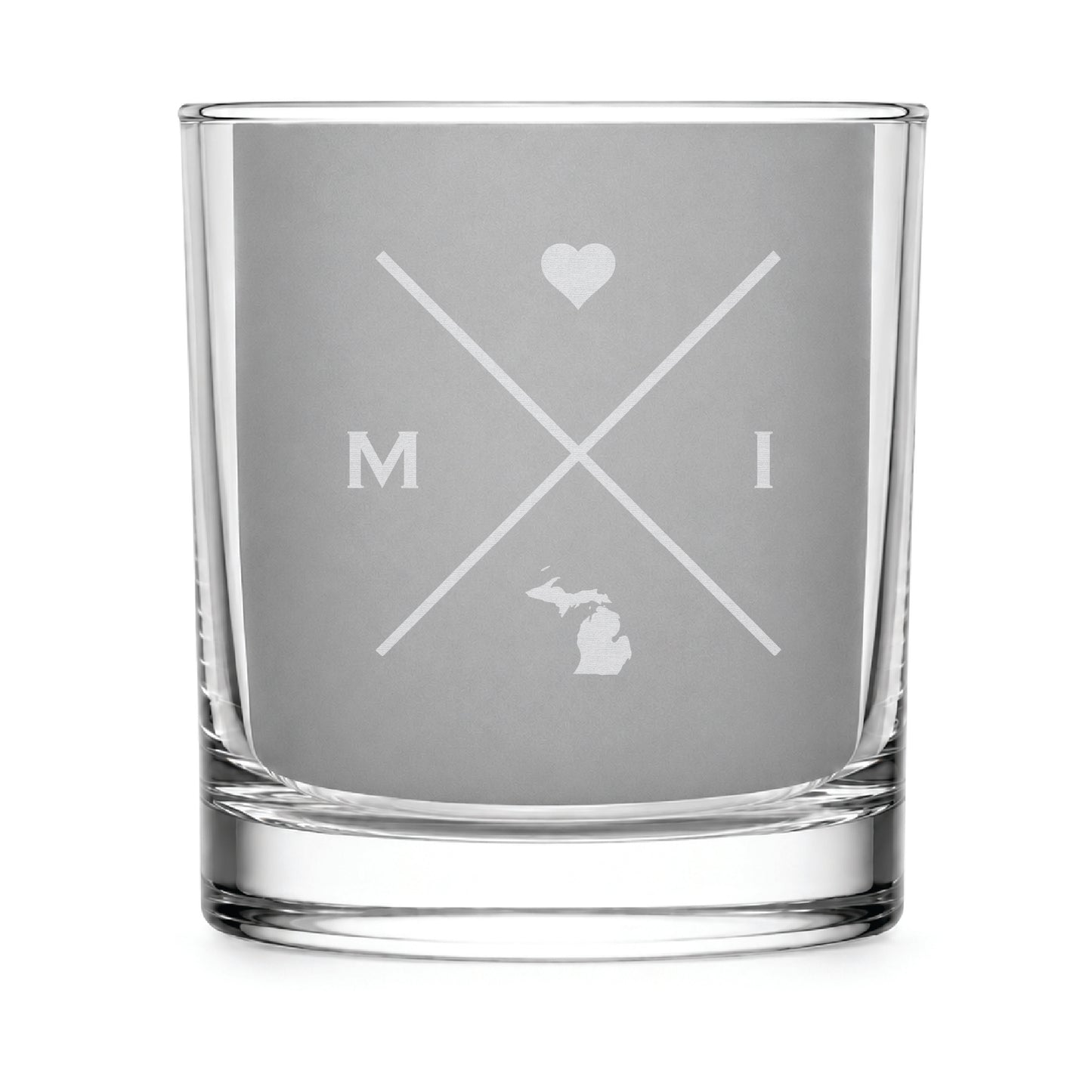 Clear engraved rocks glass featuring a minimalist crossed-line Michigan design with monogram initials, heart icon, and Michigan silhouette on a clean light background.