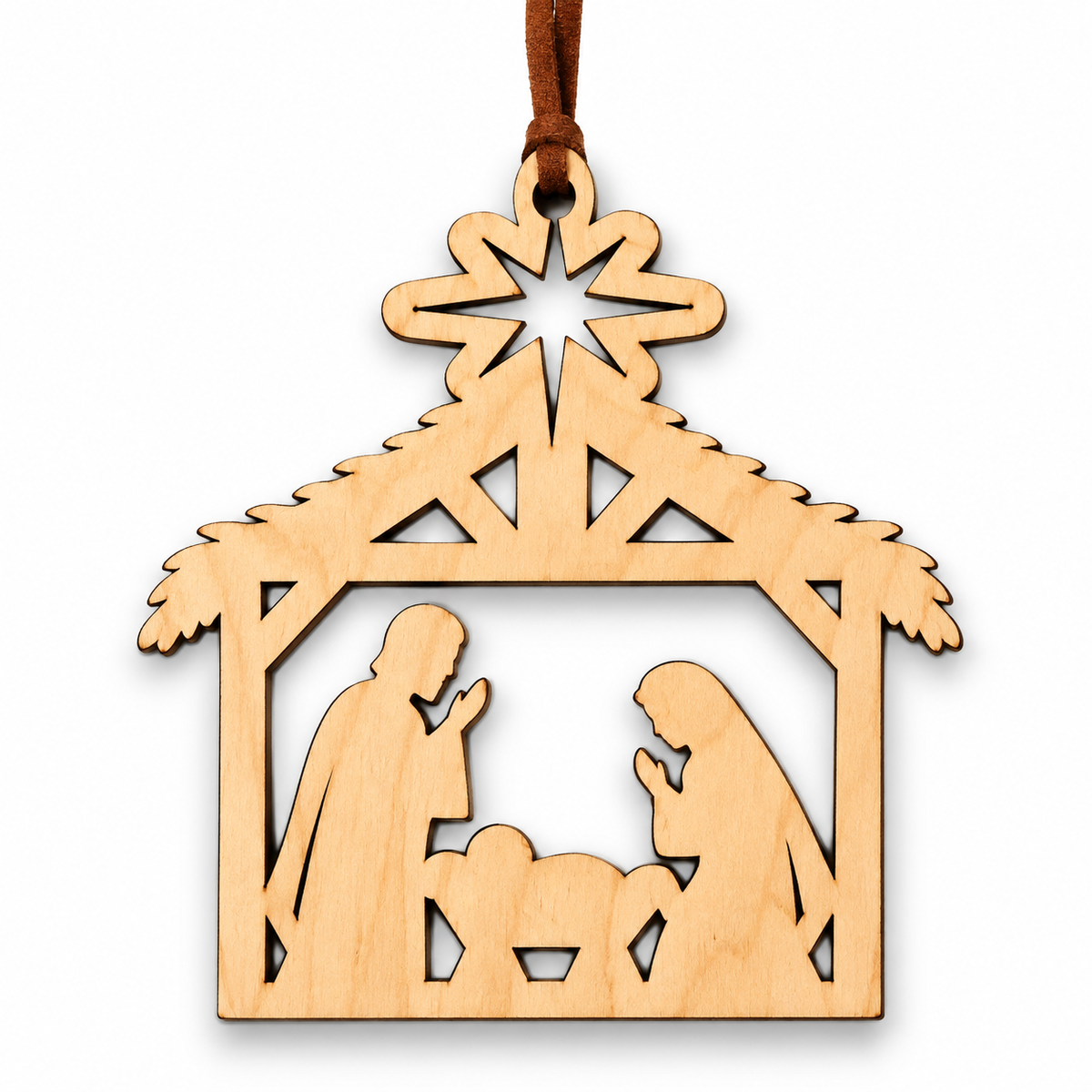 A light natural wood nativity scene ornament with laser-cut figures of Mary, Joseph, baby Jesus, and a star on a white background.