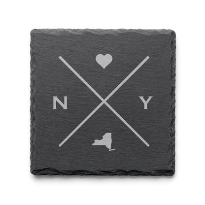 Engraved New York slate coaster featuring a minimalist crossed-line design with heart detail and New York silhouette on a clean light background.
