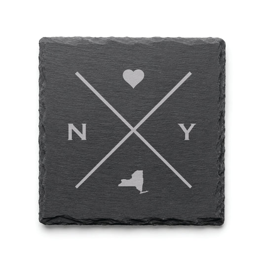 Engraved New York slate coaster featuring a minimalist crossed-line design with heart detail and New York silhouette on a clean light background.