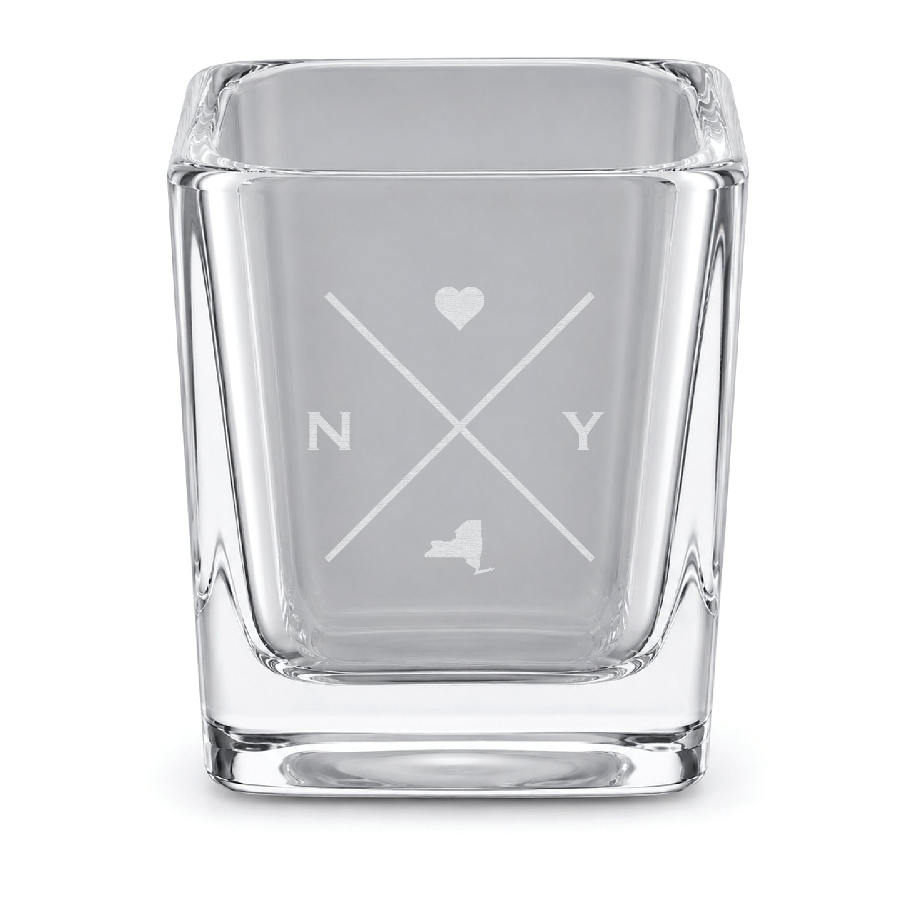Clear engraved New York shot glass featuring a minimalist crossed-line design with heart detail and New York silhouette on a clean light background.