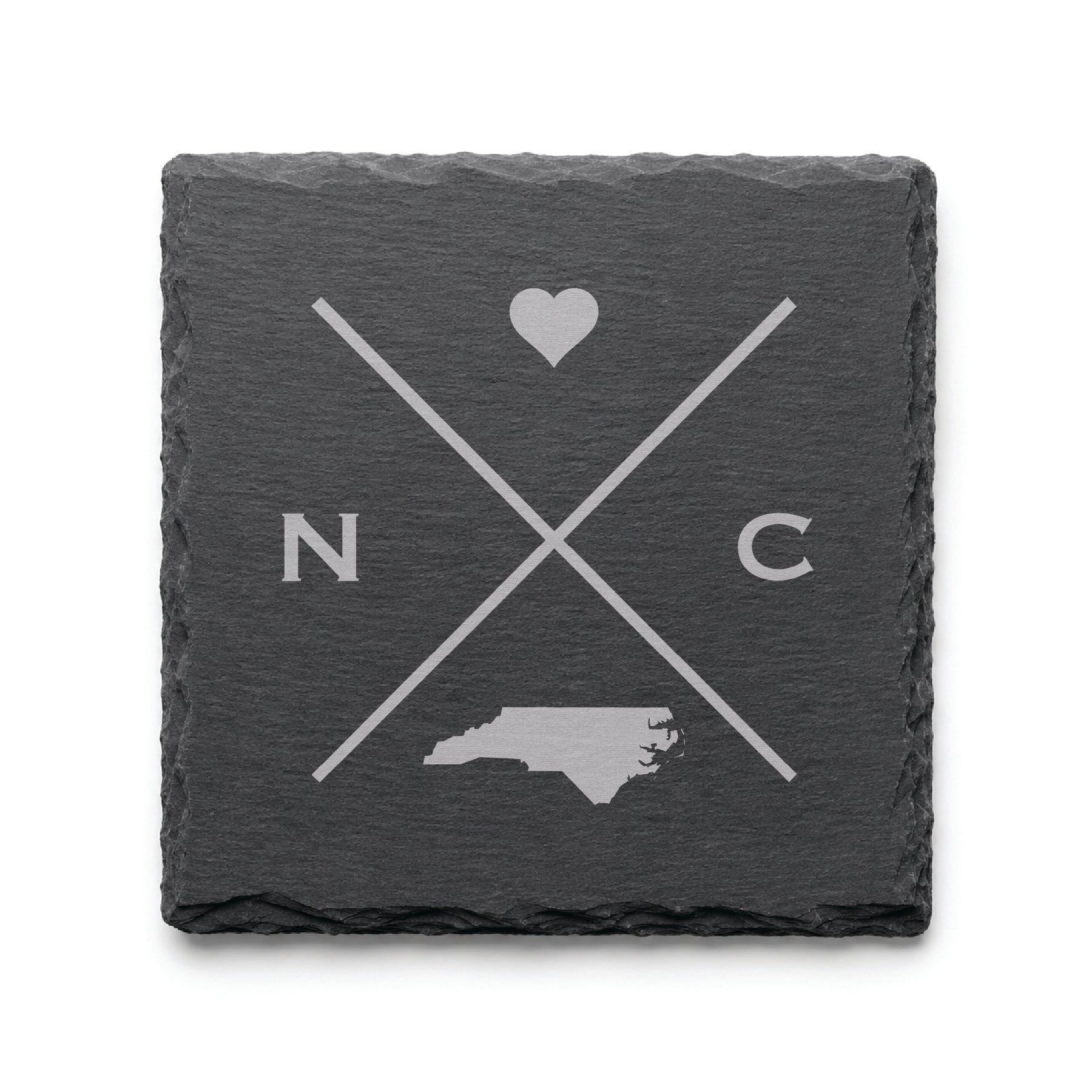 Engraved North Carolina slate coaster featuring a minimalist crossed-line design with heart detail and North Carolina silhouette on a clean light background.