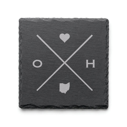 Engraved Ohio slate coaster featuring a minimalist crossed-line design with heart detail and Ohio silhouette on a clean light background.