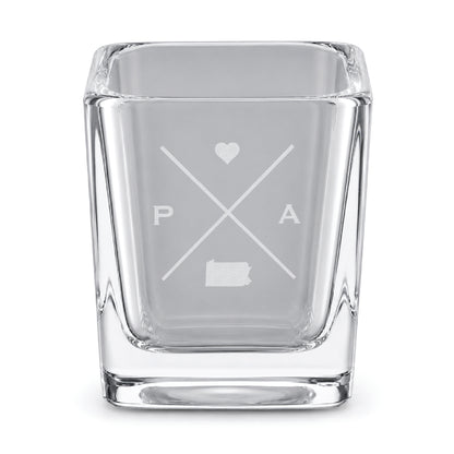 Clear engraved Pennsylvania shot glass featuring a minimalist crossed-line design with heart detail and Pennsylvania silhouette on a clean light background.