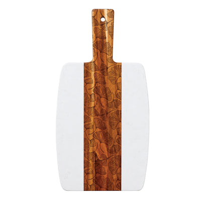 Botanical marble and acacia serving board featuring engraved ginkgo leaf pattern on the wood center panel, shown on a light gray background.