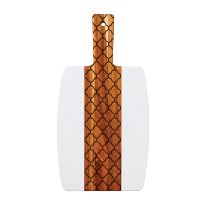 Marble and acacia charcuterie board featuring an engraved quatrefoil pattern on the wood center panel against a white background.