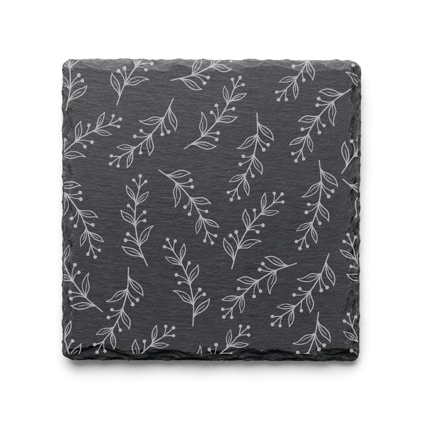 Floral Vine engraved slate coaster featuring a delicate botanical pattern with flowing vines, leaves, and berries on natural black slate.