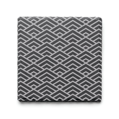 Geometric Peaks engraved slate coaster featuring a repeating geometric pattern on natural black slate.