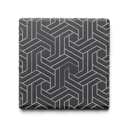 Modern Geometric engraved slate coaster featuring an interlocking geometric pattern on natural black slate.