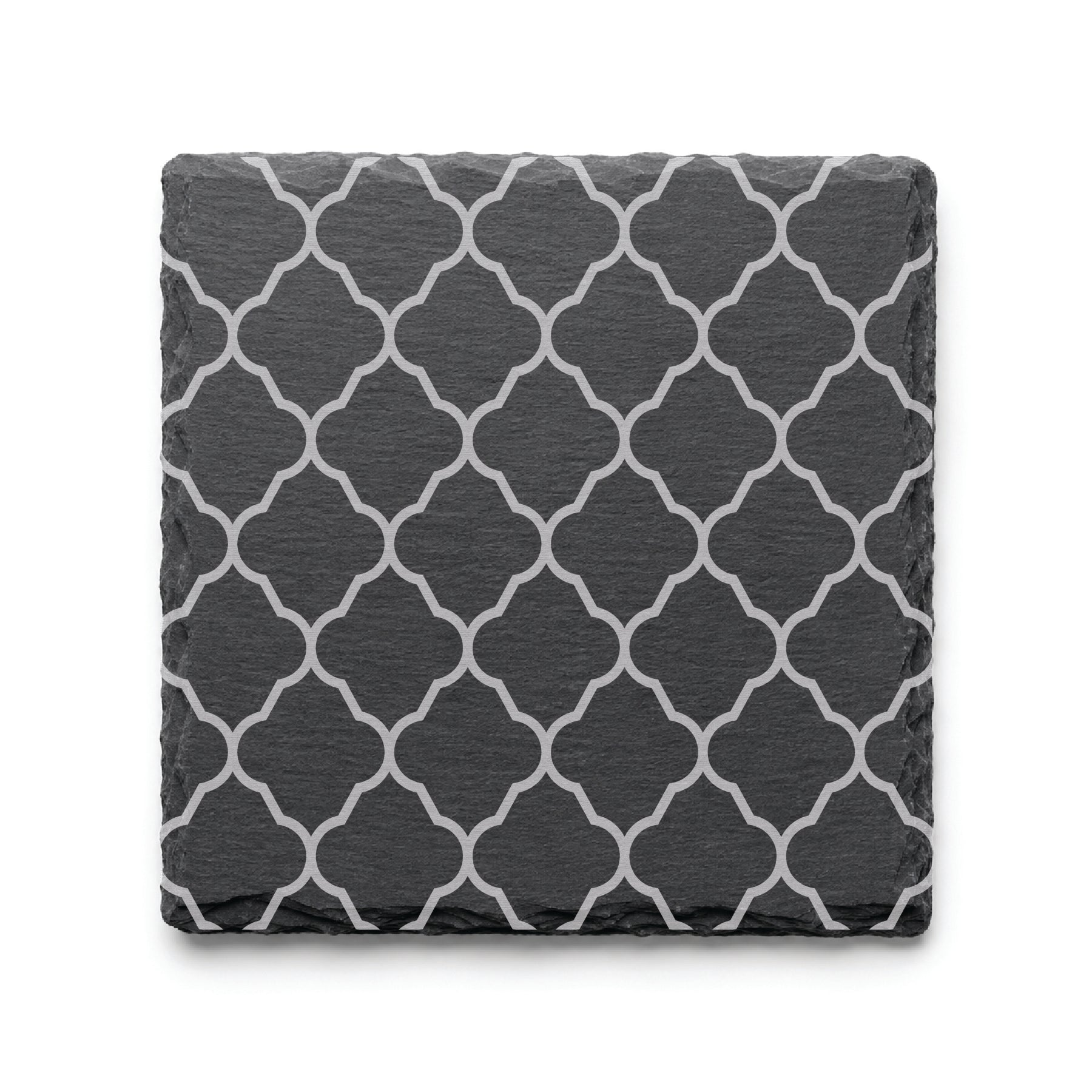Quatrefoil engraved slate coaster featuring a classic geometric lattice pattern on natural black slate.
