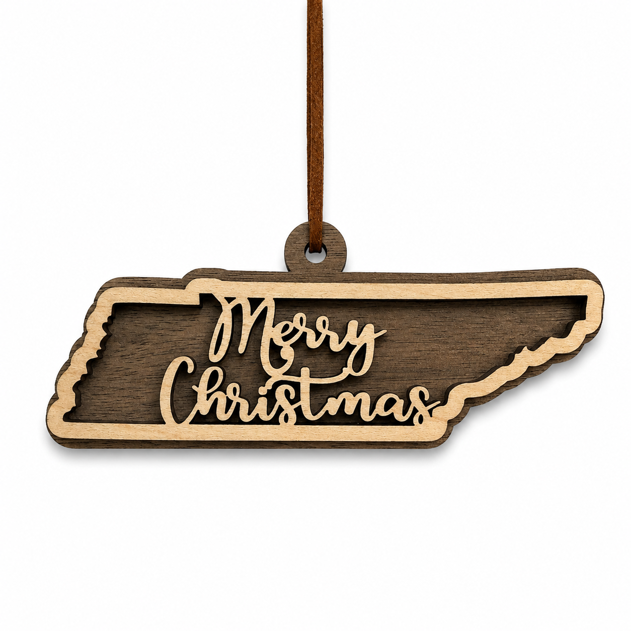 Layered Tennessee state Christmas ornament with walnut and maple wood and “Merry Christmas” script, photographed on a clean white background with faux leather hanger.