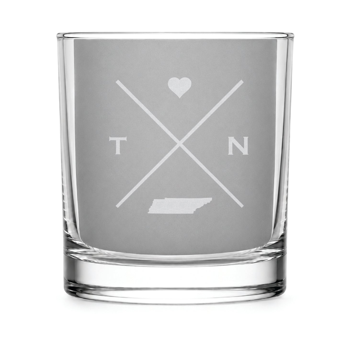 Clear engraved rocks glass featuring a minimalist crossed-line Tennessee design with monogram initials, heart icon, and Tennessee silhouette on a clean light background.