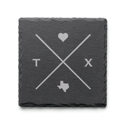 Engraved Texas slate coaster featuring a minimalist crossed-line design with heart detail and Texas silhouette on a clean light background.