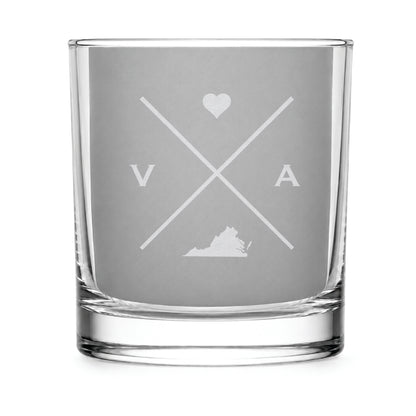 Clear engraved rocks glass featuring a minimalist crossed-line Virginia design with monogram initials, heart icon, and Virginia silhouette on a clean light background.